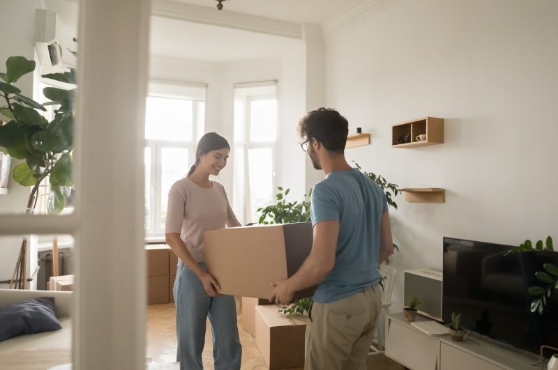 A couple moving into their first home.